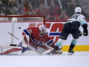 Seattle Kraken forward Marcus Johansson scores the winning shootout goal against Canadiens goalie Sam Montembeault at the Bell Centre on Saturday, March 12, 2022