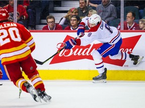 Montreal Canadiens defenceman Ben Chiarot (8) shoots the puck against the Calgary Flames during the third period at the Scotiabank Saddledome on March 3, 2022.