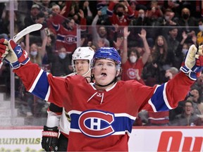 Canadiens' Cole Caufield celebrates after scoring a goal against the Ottawa Senators during the second period at the Bell Centre on Saturday, March 19, 2022, in Montreal.