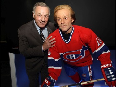 MONTREAL, QUE: APRIL 17, 2013 -- Guy Lafleur, former Montreal Canadiens great, poses with a likeness of himself at Musee Grevin at the Eaton Centre in Montreal Wednesday, April 17, 2013. The Paris-based museum of wax celebrity sculptures had an opening ceremony Wednesday.  (John Kenney/THE GAZETTE) ORG XMIT: 46490