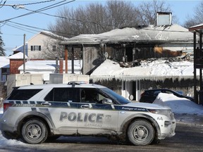 Gatineau police at scene of a fatal fire at 190 Rue St-André in Gatineau Jan. 26.