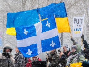 Supporters gathers at Place du Canada on Sunday. "Since the start of this crisis, Quebecers have stood in solidarity with the Ukrainian people and the Ukrainian community in Quebec," the Ministry of International Relations said in a news release Tuesday.