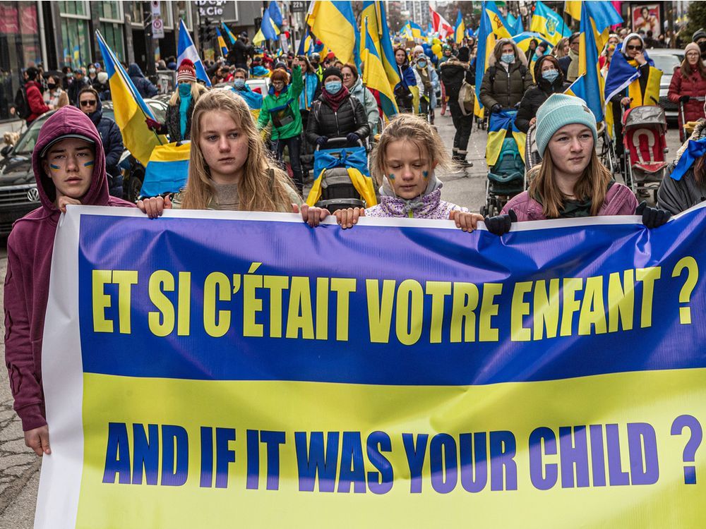  ukraine supporters marched through the streets of montreal on saturday.