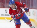 The Canadiens' Cole Caufield shoots the puck into the New Jersey Devils zone in Montreal on February 8, 2022. Caufield now has 18 goals, 17 of them coming after head coach Dominique Ducharme was fired.