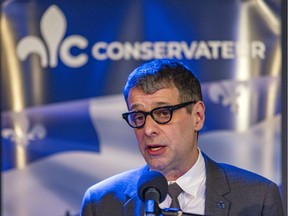 Quebec Conservative Party leader Éric Duhaime answers questions during a press conference at The Wheel Club in the Notre-Dame-de-Grace district of Montreal on Feb. 17, 2022.