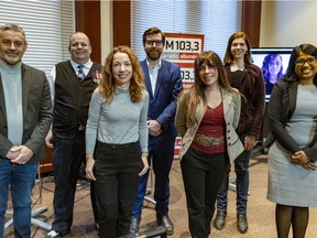 Candidates, from left, Pierre Nantel of the Parti Québécois, Florent Portron of Équipe Autonomiste, Climat Québec's Martine Ouellet, Green Party of Quebec's Alex Tyrrell, Anne Casabonne of the Parti conservateur du Québec, Liberal Émilie Nollet and Shophika Vaithyanathasarma of Québec solidaire prior to a debate in Longueuil on March 30, 2022, ahead of the byelection in Marie-Victorin. Coalition Avenir Québec candidate Shirley Dorismond appears via video at rear right.