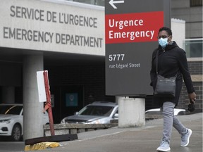 A Montrealer walks past the emergency entrance at the Jewish General Hospital.