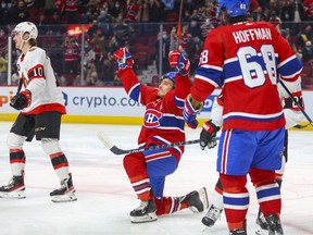 Brendan Gallagher celebrates his goal  during the first period of the Montreal Canadiens' game against the Ottawa Senators at the Bell Centre on Tuesday April 5, 2022. Teammate Mike Hoffman moves in to congratulate Gallagher while the Sens' Alex Formenton heads to the bench.
