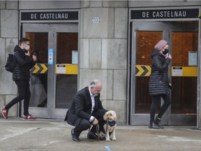 Ensemble Montréal Leader Aref Salem, with his dog Bella, outside De Castelnau station.