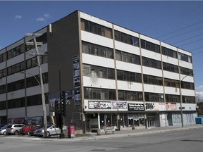 The large commercial building at 9691-9699 St-Laurent Blvd. is one of five buildings in Montreal owned or controlled by Samuel Szlamkowicz that Quebec’s attorney general is seeking to confiscate because they allegedly contained grow-ops.