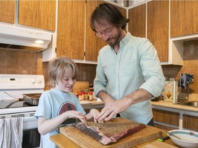 “I think it’s so important to have face-to-face interactions,” said Joseph Rosen, preparing a brisket with his son Arlo for their extended family’s Passover seder.