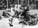 New York Islanders' Mike Bossy, 22, scores against the Atlanta Flames at the Nassau Coliseum in Uniondale, NY, on Sept. 27, 1979. 