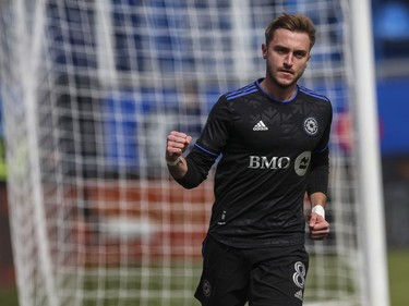 Djordje Mihailovic of CF Montréal celebrates his goal in the opening moments of the team's home opener against the Vancouver Whitecaps FC in MLS play Saturday, April 16, 2022, at Saputo Stadium.