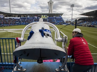A bell is rung for a goal scored in the cheering section of CF Montréal during a game against the Vancouver Whitecaps FC in MLS play Saturday, April 16, 2022, at Saputo Stadium.