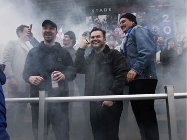 CF Montréal fans celebrate the team's second goal against Vancouver Whitecaps FC in MLS play Saturday, April 16, 2022, at Saputo Stadium.