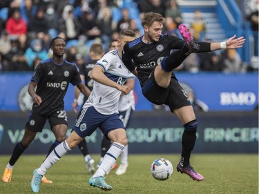 Djordje Mihailovic of CF Montréal tries to control the ball against Vancouver Whitecaps FC in MLS play Saturday, April 16, 2022, at Saputo Stadium.