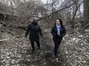 Gracia Kasoki Katahwa, mayor of Côte-des-Neiges—Notre-Dame-de-Grâce, left, and Caroline Bourgeois, executive committee member responsible for large parks in Montreal, walk up the entrance path to the future Falaise St-Jacques park last April.