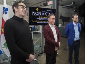 Alexandre Auché, left, program director for SAT; Luc Rabouin, city executive committee member responsible for economic development; and Mathieu Grondin, director of the nightlife lobby group MTL 24/24 at a press conference announcing a new Montreal nightlife initiative on April 21, 2022.