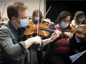 Marc Djokic, violinist and concertmaster with the Orchestre classique de Montréal, performs during rehearsals for Thursday's concert dedicated to Boris Brott, who was killed by a hit-and-run driver on April 5.