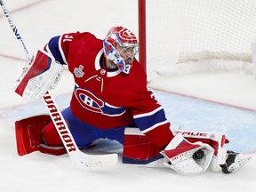 Montreal Canadiens' Carey Price makes a save in the third period against the Tampa Bay Lightning during the Stanley Cup finals in Montreal on July 2, 2021.