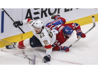 Canadiens' Jordan Harris and Brandon Montour of the Florida Panthers collide at the Bell Centre in Montreal on Friday, April 29, 2022.
