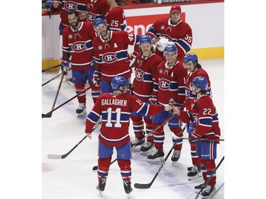Canadiens' Brendan Gallagher surprises Cole Caufield  by handing him the microphone at the end of the game against the Florida Panthers at the Bell Centre in Montreal on Friday, April 29, 2022.