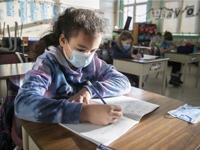 Student in class at Willingdon Elementary School. Teachers say roughly 80 to 90 per cent of students are still wearing their masks in class.