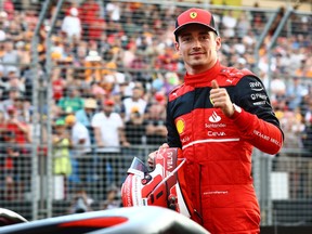 Pole position qualifier Charles Leclerc of Monaco and Ferrari celebrates in parc fermé during qualifying ahead of the F1 Grand Prix of Australia at Melbourne Grand Prix Circuit on April 09, 2022 in Melbourne, Australia.