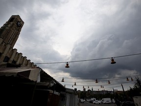 Storm clouds brew over the Atwater Market in Montreal, on July 30, 2019.