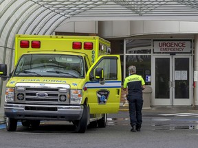 An ambulance parked outside the Lakeshore General Hospital emergency department.