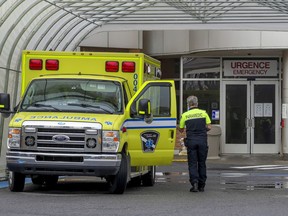 An ambulance parked outside the Lakeshore General Hospital emergency department. The public was told on Friday evening, June 10, 2022, to avoid the hospital because of staff shortages