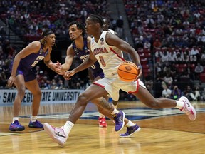Arizona Wildcats guard Bennedict Mathurin (0) controls the ball against TCU Horned Frogs guard Micah Peavy (0) in the first half during the second round of the 2022 NCAA Tournament at Viejas Arena.