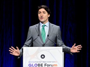 Prime Minister Justin Trudeau gestures as he makes a keynote speech on Canada’s emissions reduction plan at the GLOBE Forum 2022 in Vancouver. Canadians have a right to be skeptical about the plan, given our history of not meeting promised targets in the past.