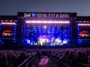 Festival-goers attend the Festival d'été de Québec in Quebec City on July 10, 2018.