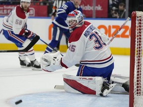 Canadiens goaltender Sam Montembeault watches as the puck goes wide of his net against the Maple Leafs in Toronto on Saturday, April 9, 2022.