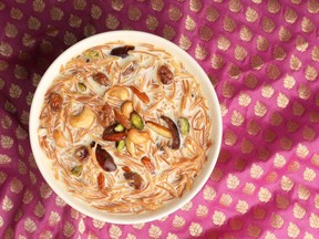 Sheer korma (toasted vermicelli in sweetened milk) is a traditional South Asian dish served at Eid. Fariha Naqvi-Mohamed serves it at her home, as well as a more recent tradition for her family, waffles with fried egg and cheese.