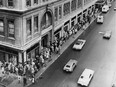 Montrealers line up to buy vouchers for Olympic tickets at Eaton's department store on Ste- Catherine St. on May 5, 1975.