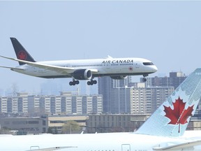 An Air Canada flight from Narita International airport in Tokyo, Japan arrives at  Toronto Pearson International airport's Terminal 3 at 2 p.m. on Friday April 23, 2021. Jack Boland/Toronto Sun/Postmedia Network