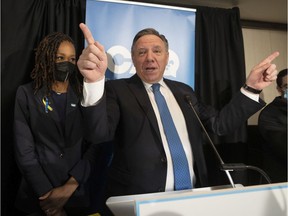 CAQ candidate Shirley Dorismond celebrates with Quebec Premier François Legault after winning the Marie-Victorin byelection in Longueuil 
on Monday, April 11, 2022.