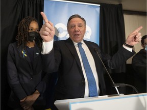 CAQ candidate Shirley Dorismond celebrates with Quebec Premier François Legault after winning the Marie-Victorin byelection in Longueuil
on Monday, April 11, 2022.