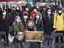 People take part in a climate change protest in Montreal on March 25, 2022.