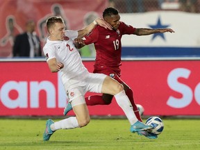 Team Canada defender Alistair Johnston battles Panama's Alberto Quintero during World Cup qualifier at Panama City on March 30, 2022