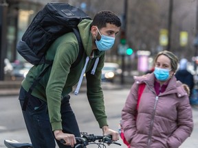 Montrealers continue to wear masks around town on Friday April 29, 2022.