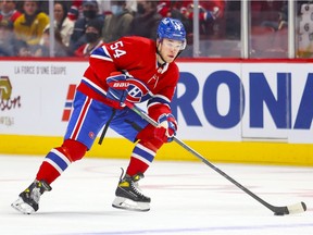 Montreal Canadiens rookie Jordan Harris carries the puck during third period against the Ottawa Senators in Montreal on April 5, 2022.
