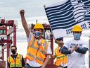 Striking workers at the Port of Montreal express their anger on April 29, 2021 at the federal government's adoption of legislation forcing them to return to work.