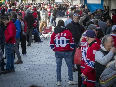 Fans of Guy Lafleur,  wait along Av. des Canadiens-de-Montreal on Sunday, May 1, 2022, prior to the opening of the Bell Centre, where he lies in state for the next two days.