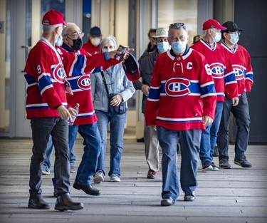 Hockey fans leave the Guy Lafleur public visitation at the Bell Centre in Montreal Sunday, May 1, 2022.