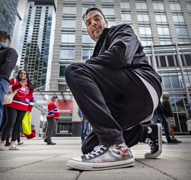Torontonian John Catenacci wore a custom pair of sneakers to the Guy Lafleur public visitation at the Bell Centre in Montreal Monday, May 2, 2022.