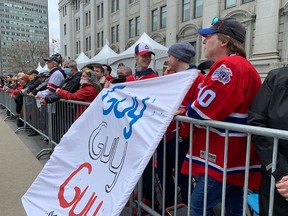 Canadiens fans line up across the street from Mary, Queen of the World Cathedral ahead of the Quebec national funeral for Guy Lafleur on May 3, 2022.