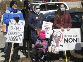 Protesters show their opposition to the plan for the REM de l'Est on Saturday April 2, 2022.